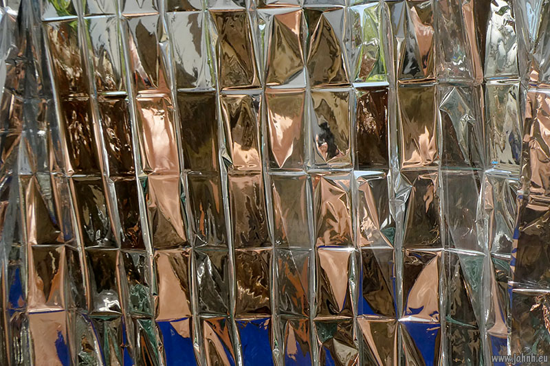Images made with solar film keeping heat out of windows.